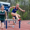 women running hurdles