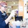 Student working in Science Center lab. Graduate biology program, graduate biology degree, graduate biology major, degree in graduate biology, biology major. 