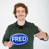 Dominik Zimmer, an environmental science student in STEM holding a FRED sign 