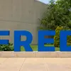 Campus scene featuring the large FRED letters
