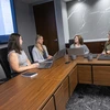 accountants talk in a conference room