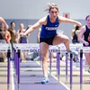 women running hurdles